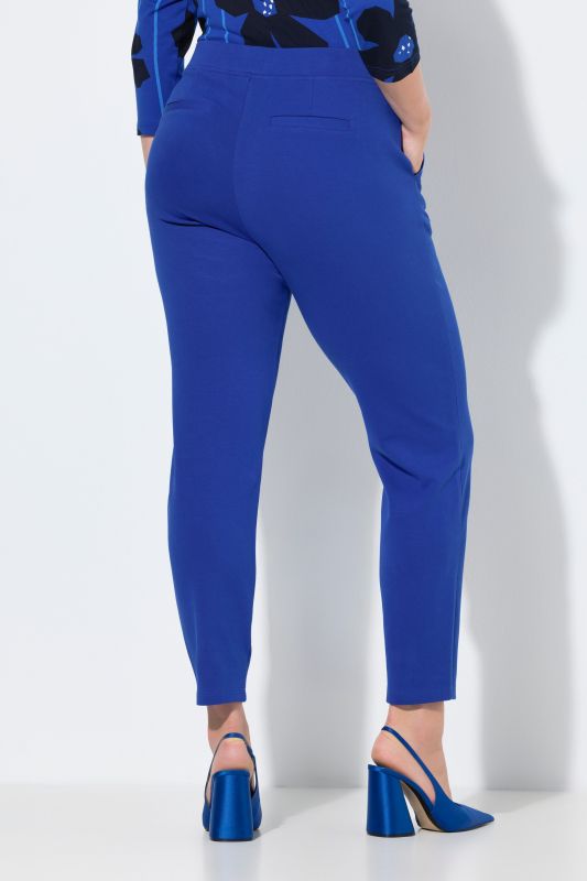 Pantalon point de Rome, jambe carotte. Taille élastique, plis fantaisie
