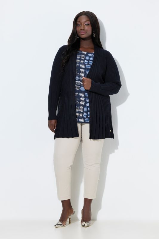 Cardigan plissé. Col châle et manches longues. Coupe évasée