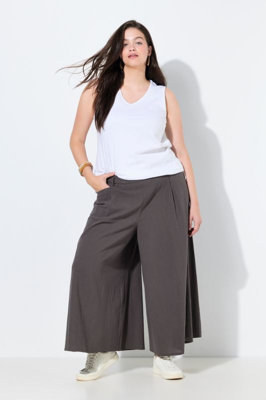 Pantalon 7/8 en coton bio. Jambe large et taille élastique