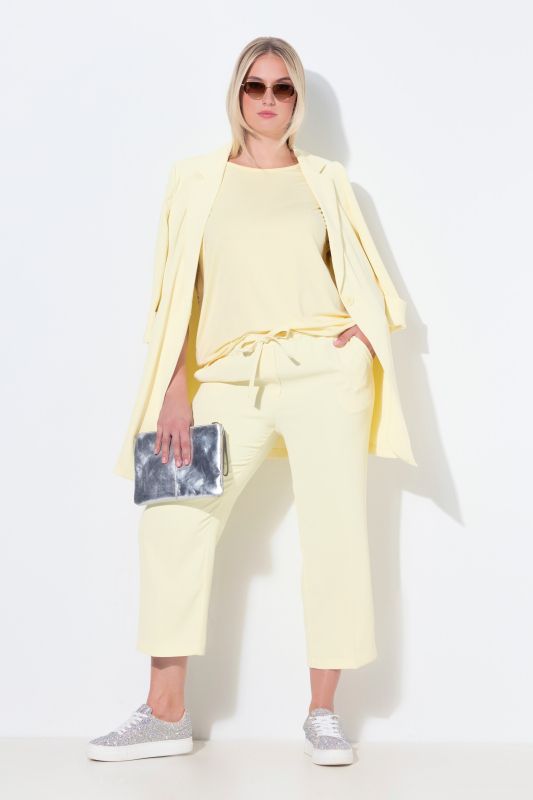 Pantalon 7/8 à pinces. Taille élastique