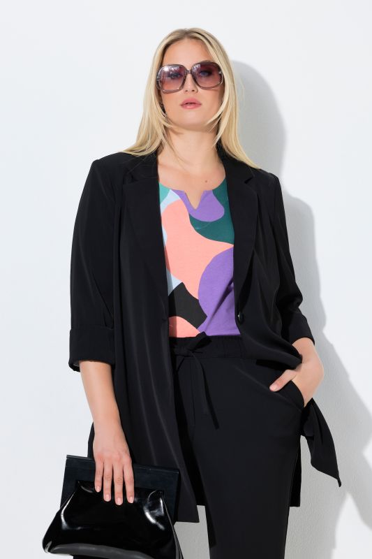 Blazer col à revers. Fermeture 1 bouton et manches 3/4