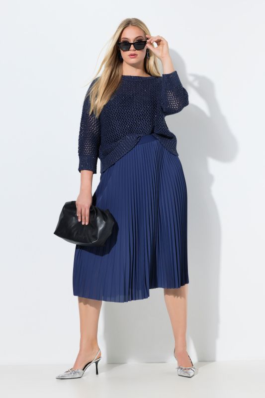 Jupe plissée longueur midi, taille élastique et coupe évasée