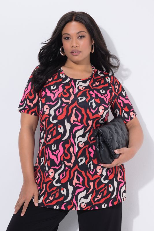 T-shirt long dans un imprimé zébré, col rond et manches courtes, coupe évasée