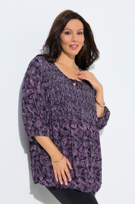 Blouse smockée, décolleté rond et manches 3/4, pli d'aisance dans le cos