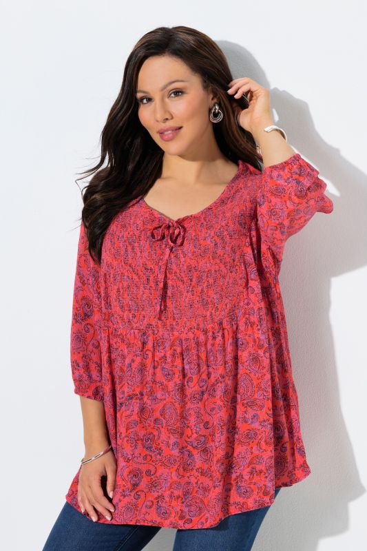 Blouse smockée, décolleté rond et manches 3/4, pli d'aisance dans le cos