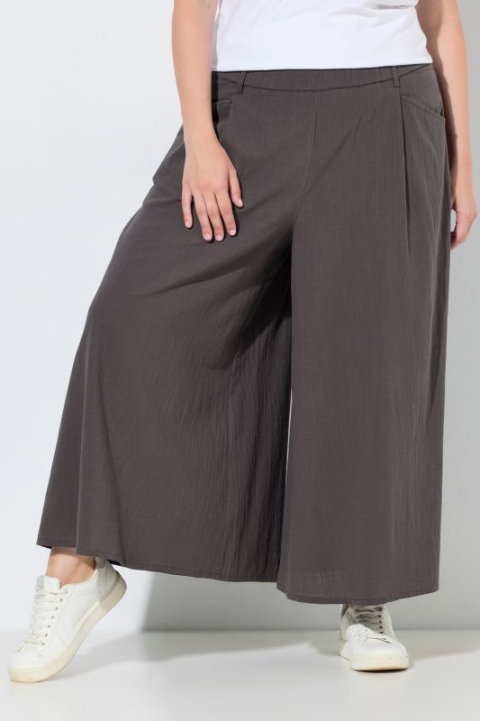 Pantalon 7/8 en coton bio. Jambe large et taille élastique