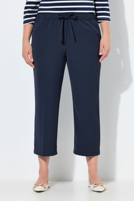 Pantalon 7/8 à pinces. Taille élastique