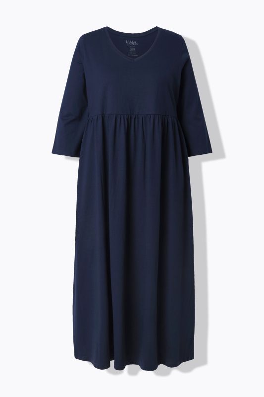Robe en jersey avec poches, couture empire, décolleté en V et manches 3/4