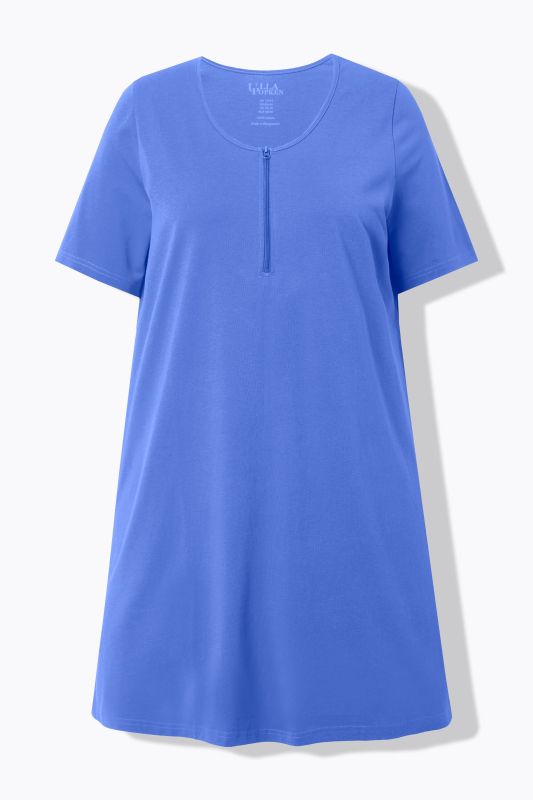 T-shirt long à fermeture zippée. Décolleté rond, manches courtes. Coupe évasée