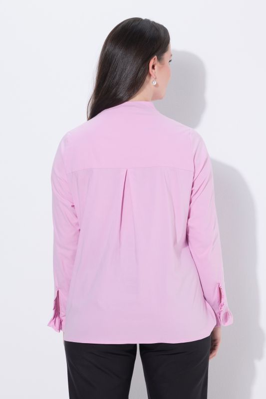 Blouse manches longues et col calice, poignets avec ruchés