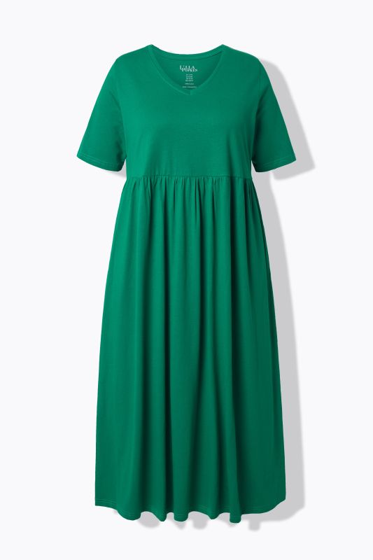 Robe maxi, coupe évasée. Décolleté V, manches courtes. Poches