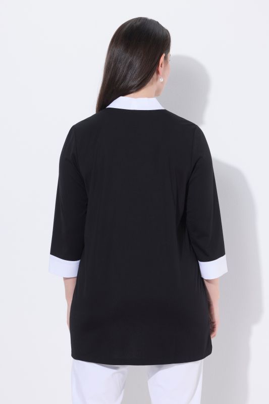 Blouse à ruban fantaisie. Décolleté V et manches 3/4. Coupe évasée