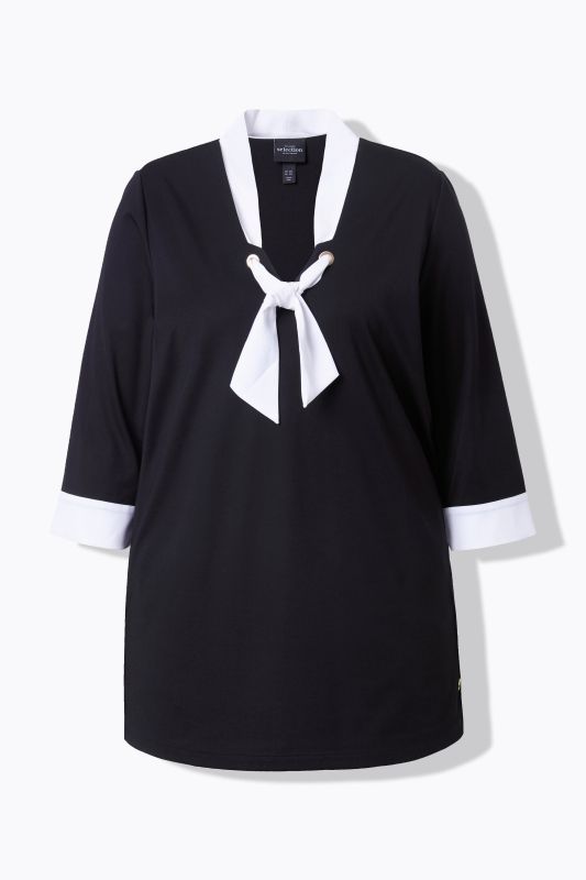 Blouse à ruban fantaisie. Décolleté V et manches 3/4. Coupe évasée