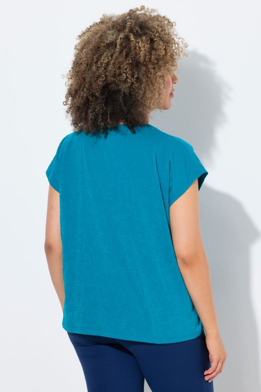 T-shirt oversize à col rond, tissu dévoré, sans manches