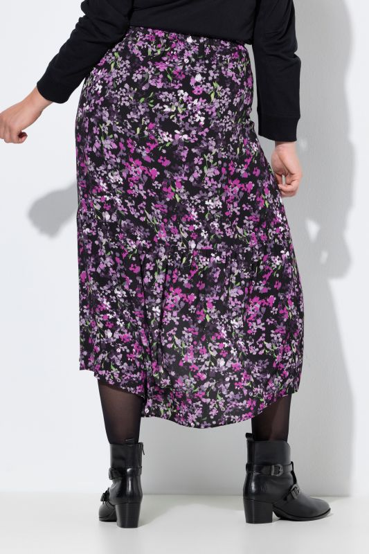 Jupe midi motif à fleurs, base asymétrique, taille élastique et coupe évasée