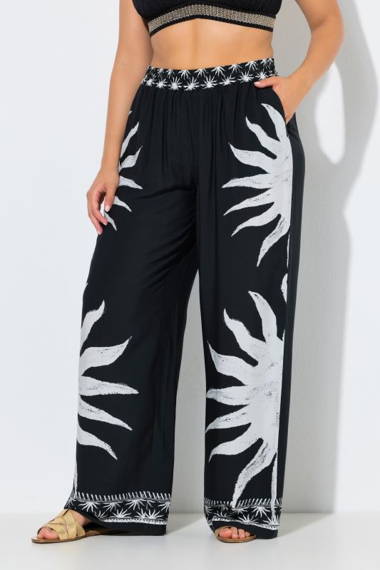Pantalon palazzo, motif soleils, jambe large et taille élastique
