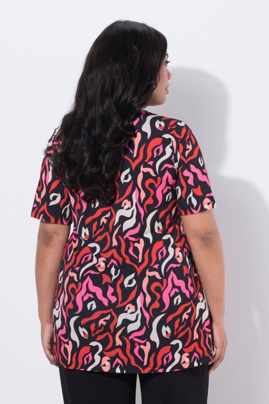 T-shirt long dans un imprimé zébré, col rond et manches courtes, coupe évasée