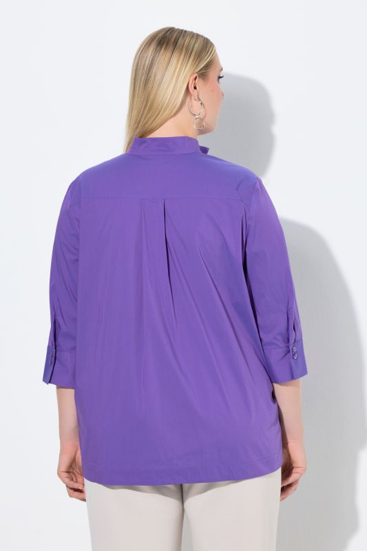 Blouse avec large patte, col montant et manches 3/4