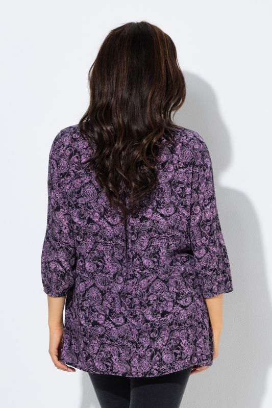 Blouse smockée, décolleté rond et manches 3/4, pli d'aisance dans le cos