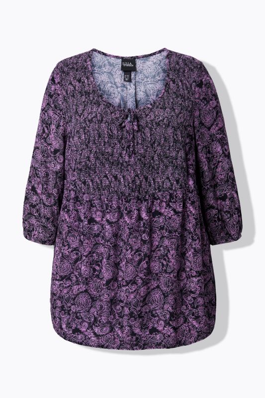 Blouse smockée, décolleté rond et manches 3/4, pli d'aisance dans le cos