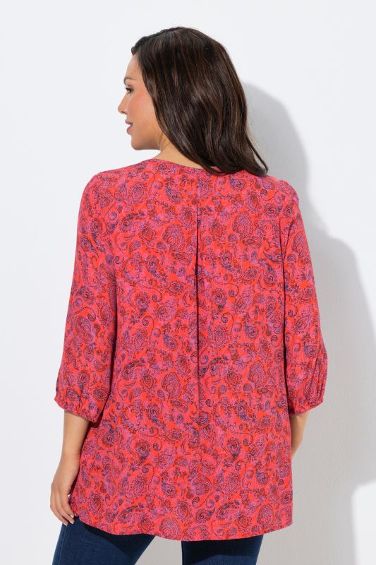 Blouse smockée, décolleté rond et manches 3/4, pli d'aisance dans le cos