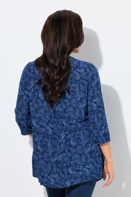 Blouse smockée, décolleté rond et manches 3/4, pli d'aisance dans le cos