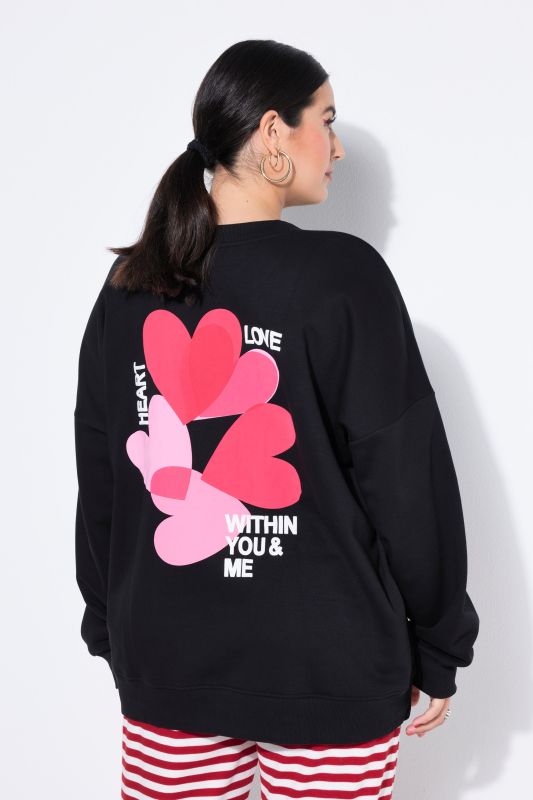 Sweat-shirt oversize avec des cœurs colorés dans le dos
