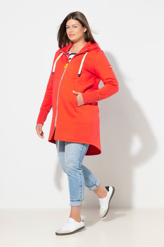 Veste à capuche en molleton. Coupe longue. Cordon de serrage dans la taille. Manches longues