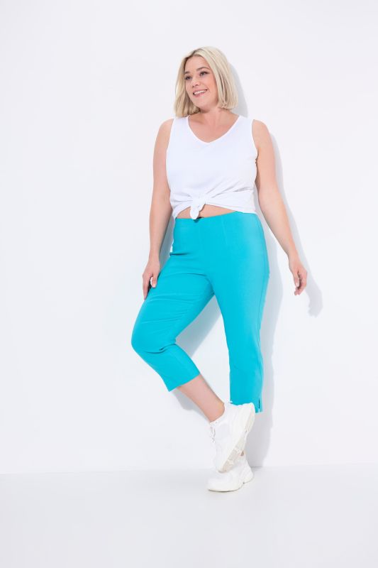 Pantalon en bengaline stretch. Longueur au mollet et taille élastique