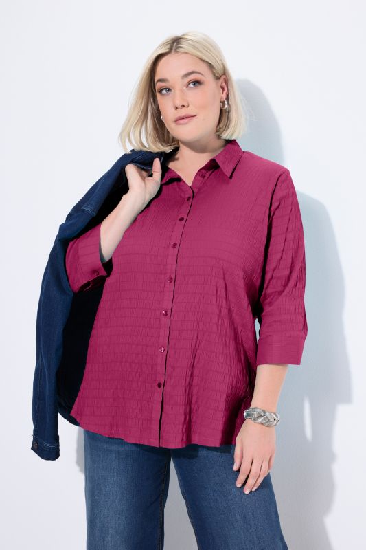 Chemisier en tissu gaufré. Col classique et manches 3/4