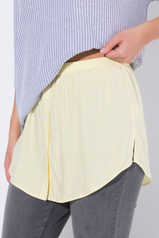 Rallonge chemisier, base arrondie et coupe évasée