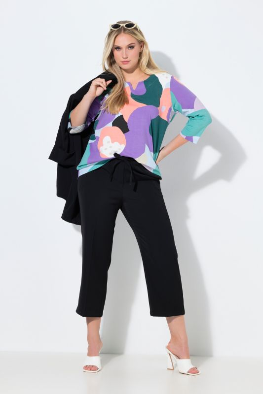 Pantalon 7/8 à pinces. Taille élastique