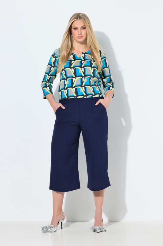 Jupe-culotte à taille élastique. Jambe large, longueur mollet