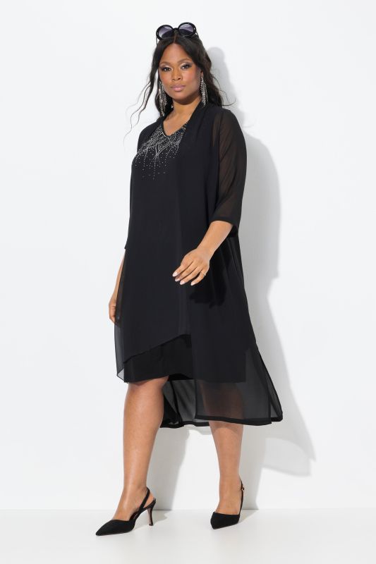 Veste longue en mousseline. Col châle et manches 3/4. Coupe ouverte