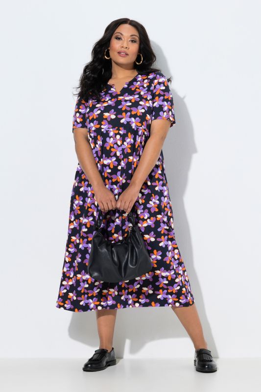 Robe maxi coupe évasée, poches, col tunisien et manches courtes