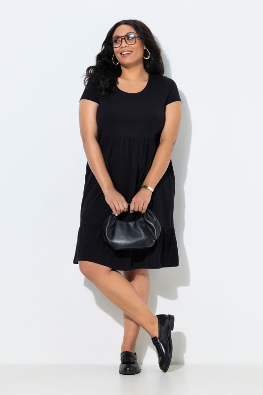 Robe en jersey avec poches, décolleté rond et manches courtes, coupe évasée