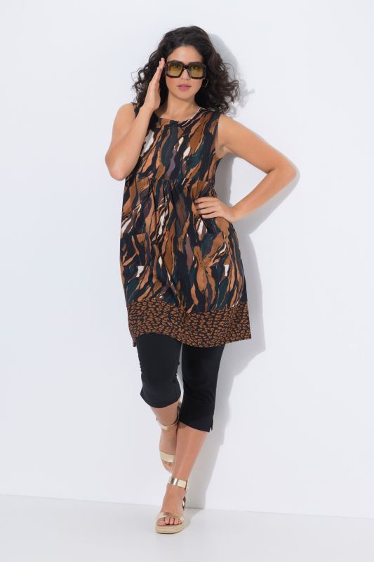 Robe en jersey sans manches, bordure contrastante à la base et décolleté rond, coupe évasée