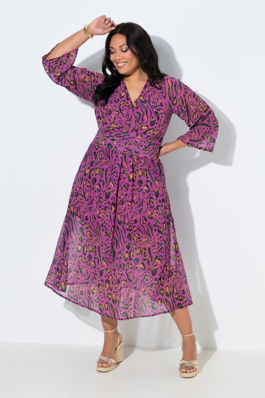 Robe en jersey, motif léopard, décolleté en V et manches longues trompette