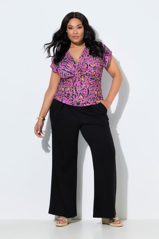Pantalon à pinces, jambe large et taille élastique