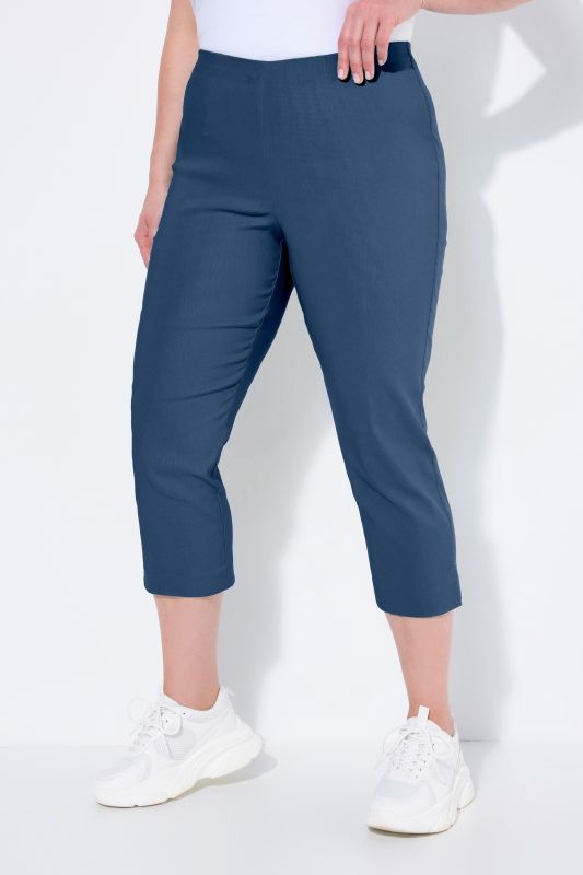 Pantalon en bengaline stretch. Longueur au mollet et taille élastique