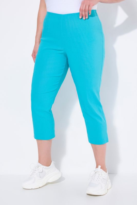 Pantalon en bengaline stretch. Longueur au mollet et taille élastique