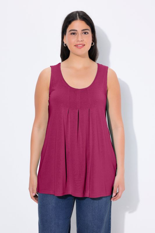 Débardeur en modal à jolis plis creux. Coupe évasée, encolure ronde et larges bretelles