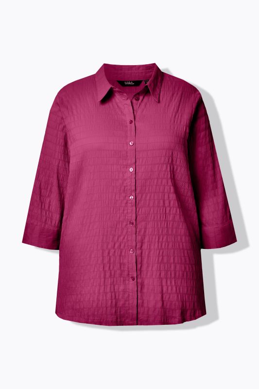 Chemisier en tissu gaufré. Col classique et manches 3/4