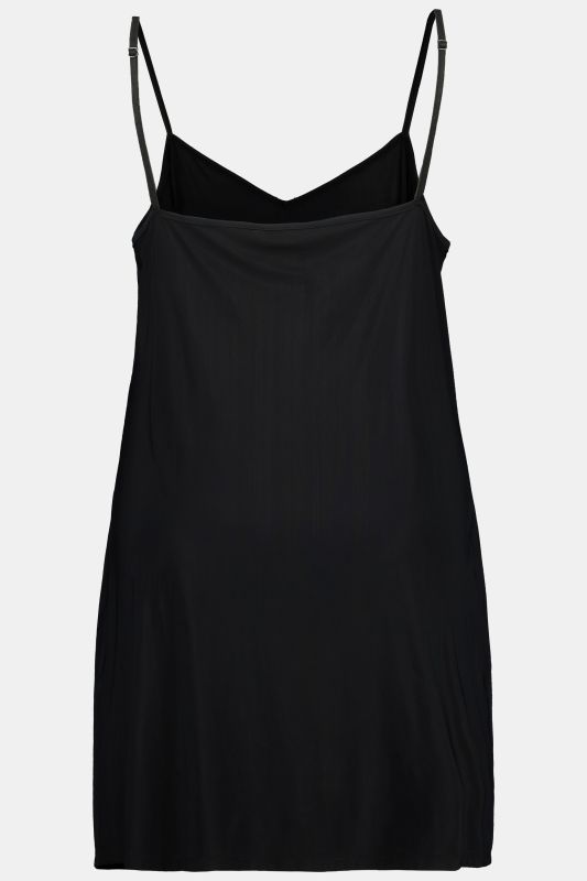 Combinette, coupe évasée. Décolleté V. Bretelles spaghetti