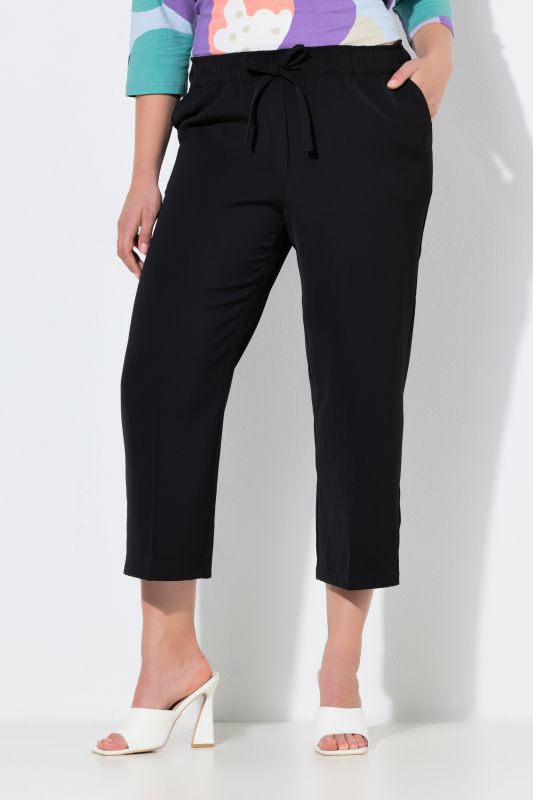Pantalon 7/8 à pinces. Taille élastique