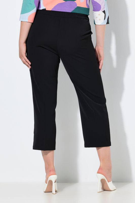 Pantalon 7/8 à pinces. Taille élastique