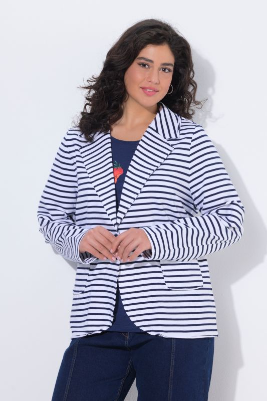 Blazer en jersey. Manches longues et col à revers. Finitions bord roulé