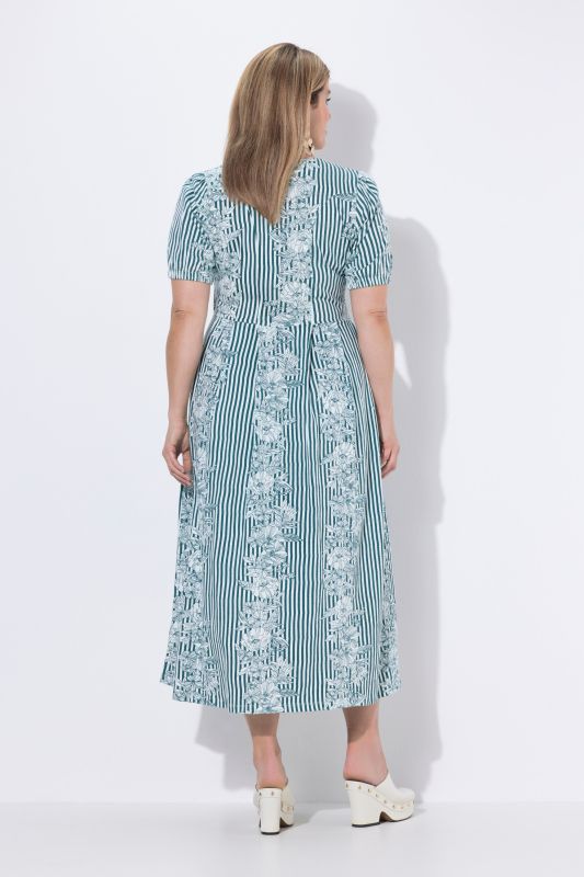 Robe maxi oversize en jersey. Décolleté rond et manches courtes. Imprimé à fleurs