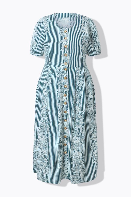 Robe maxi oversize en jersey. Décolleté rond et manches courtes. Imprimé à fleurs