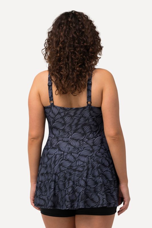 Robe de bain à bonnets souples. Décolleté rond. Matière recyclée, imprimé coquillages.